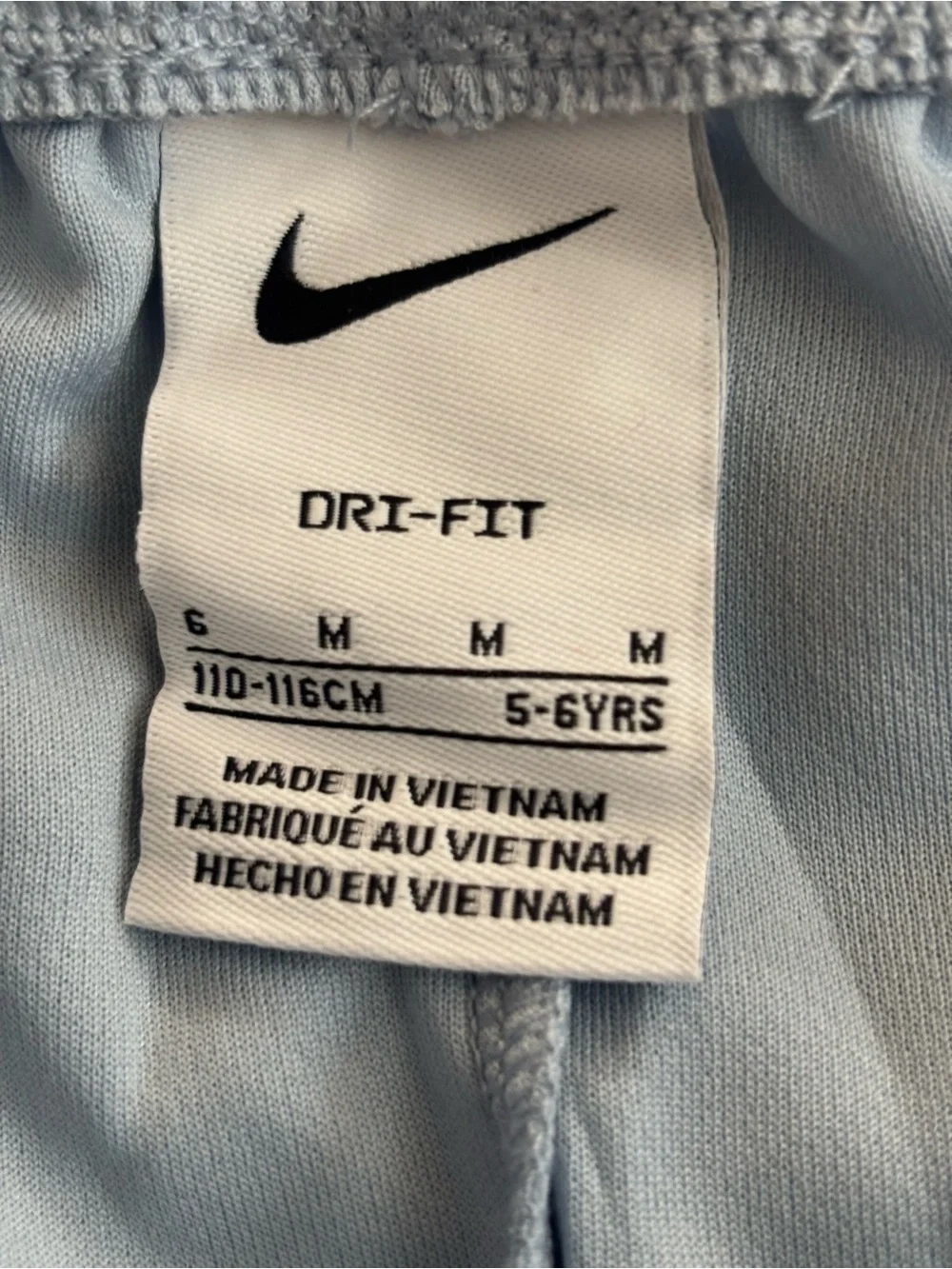 Nike kids Pale Blue Athletic Shorts with White Swoosh